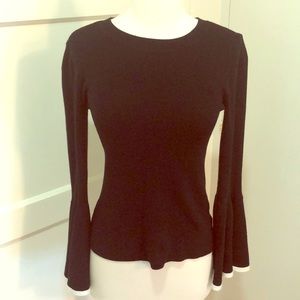 Bell-sleeved black sweater by Matty M